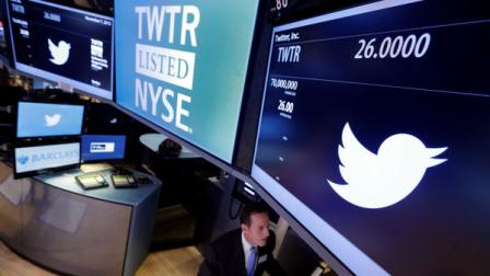 Specialist Glenn Carell, who will handle the Twitter IPO, works at his post on the floor of the New York Stock Exchange, Thursday, Nov. 7, 2013. Twitter set a price of $26 per share for its initial public offering on Wednesday evening and will begin trading Thursday under the ticker symbol TWTR in the most highly anticipated IPO since Facebooks 2012 debut. (AP Photo/Richard Drew)