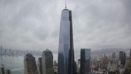 One World Trade Center, center, is seen from the 56th floor of its neighbor, 4 World Trade Center, Thursday, Nov. 7, 2013, in New York. he 1,776-foot One World Trade Center is the marquee skyscraper at ground zero. (AP Photo/Mark Lennihan)