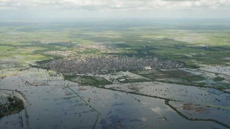 This photo released by the African Union-United Nations Information Support Team shows an aerial view of flooding in and around Jowhar town in Somalia Tuesday, Nov. 12, 2013. Heavy rains in Somalia coupled with recent disputes between clans have resulted in displaced people seeking shelter at an African Union Mission in Somalia (AMISOM) military base near the town of Jowhar, according to AMISOM, while Somali Prime Minister Abdi Farah Shirdon appealed Monday for assistance for those affected. (AP Photo/AU-UN IST, Tobin Jones)