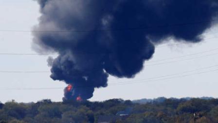 A gas pipeline burns near Milford, Texas, Thursday, Nov. 14, 2013. A Chevron gas pipeline exploded in rural North Texas with no injuries and officials are allowing the fire to burn out. (AP Photo/LM Otero)