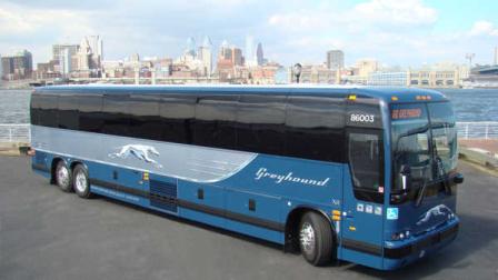 A new Greyhound bus, which features leather seats, extra legroom, Wi-Fi, power outlets, three-point seat belts, on-board restroom and wheelchair lift. (PRNewsFoto/Greyhound Lines, Inc.)