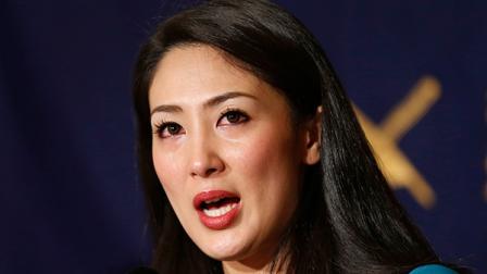 Miss International 2012 Ikumi Yoshimatsu speaks during a press conference at the Foreign Correspondents Club of Japan in Tokyo Monday, Dec. 16, 2013. Yoshimatsu, a Japanese beauty queen wont be handing over her crown to her successor after she refused to sign with a major talent agency. The winner of last years Miss International contest, has filed a criminal complaint against a top agency executive alleging obstruction of business, stalking, intimidation and extortion. (AP Photo/Shizuo Kambayashi)