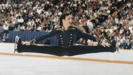 Brian Boitano of Sunnyvale, Calif., leaps in the air, touching his skates during the free skating competition in Calgary, Canada on Saturday, Feb. 20, 1988. Boitano won the Olympic mens figure skating championship, giving the United States its first gold medal in the XV Winter Olympics. (AP Photo/John Redman)