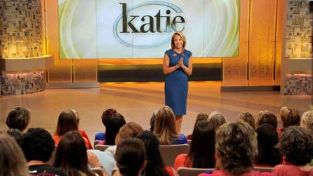 This image released by ABC shows host Katie Couric making her debut appearance for her syndicated talk show Katie, Monday, Sept. 10, 2012 in New York. (AP Photo/Disney-ABC Domestic Television, Ida Mae Astute)