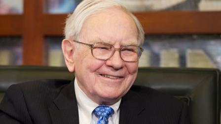 In this May 6, 2013 photo, Warren Buffett smiles during a television interview in Omaha, Neb. (AP Photo/Nati Harnik)