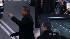 Barack Obama emerges from the presidential limo...