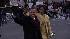 Barack Obama and Michelle Obama wave as they...
