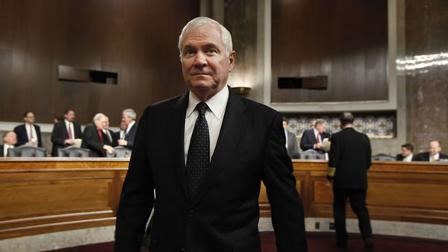 Defense Secretary Robert Gates arrives on Capitol Hill in Washington.