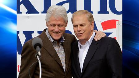 Former President Bill Clinton embraces Ohio Gov. Ted Strickland, right, during a campaign rally in Canton, Ohio Saturday, Oct. 30, 2010. (AP Photo/Mark Duncan)
