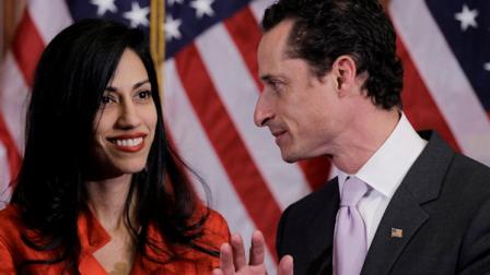 Rep. Anthony Weiner, D-N.Y., and his wife, Huma Abedin, aide to Secretary of State Hillary Rodham Clinton, are pictured after a ceremonial swearing in of the 112th Congress on Capitol Hill in Washington, Wednesday, Jan. 5, 2011. (AP Photo/Charles Dharapak)