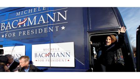 Republican presidential candidate, Rep. Michele Bachmann, R-Minn. waves from her bus following a campaign stop at Valley High School, Tuesday, Jan. 3, 2012, in West Des Moines, Iowa. (AP Photo/Eric Gay)