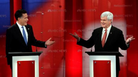 Republican presidential candidates former Massachusetts Gov. Mitt Romney, left, and former House Speaker Newt Gingrich gesture during a Republican presidential debate Monday Jan. 23, 2012, at the University of South Florida in Tampa, Fla. (AP Photo/Paul Sancya)