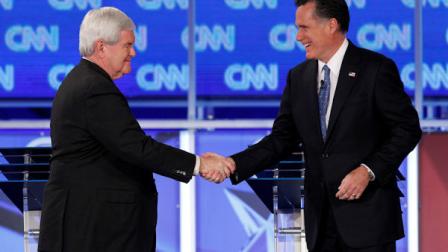 Republican presidential candidates former House Speaker Newt Gingrich and former Massachusetts Gov. Mitt Romney shake hands at the Republican presidential candidates debate at the University of North Florida in Jacksonville, Fla., Thursday, Jan. 26, 2012. (AP Photo/Matt Rourke)