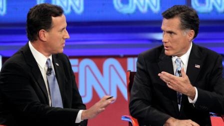Republican presidential candidate, former Massachusetts Gov. Mitt Romney, right, debate a point with former Pennsylvania Sen. Rick Santorum during a Republican presidential debate Wednesday, Feb. 22, 2012, in Mesa, Ariz. (AP Photo/Jae C. Hong)