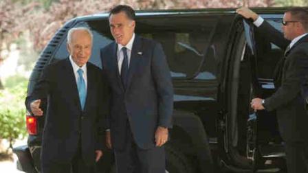 Israels President Shimon Peres, left, and US Republican presidential candidate Mitt Romney walk during a meeting at the Presidents residence in Jerusalem, Sunday, July 29, 2012. Romney would back an Israeli military strike against Iran aimed at preventing Tehran from obtaining nuclear capability, a top foreign policy adviser said early Sunday, outlining the aggressive posture the Republican presidential candidate will take toward Iran in a speech in Israel later in the day. (AP Photo/Sebastian Scheiner)