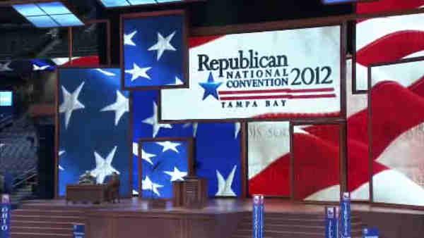 Republicans showcase Romney as storm clouds convention