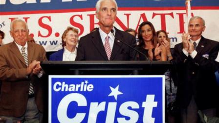 Florida Gov. Charlie Crist, center, concedes his defeat to Republican Marco Rubio in the campaign for the Senate,Tuesday, Nov. 2, 2010, in St. Petersburg, Fla. With him, from left, are parents Charles Sr. and Nancy, wife Carole and Florida State Senator Mike Fasano, right. (AP Photo/Mike Carlson)