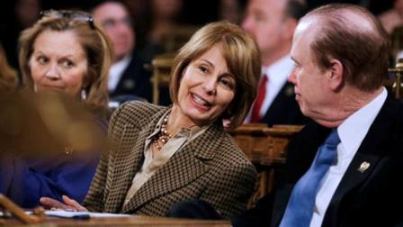 New Jersey state Sen. Barbara Buono, center, D-Edison, talks with Assemblyman Patrick J. Diegnan, D-South Plainfield, as Gov. Chris Christie delivers his State Of The State address Tuesday, Jan. 8, 2013, in Trenton, N.J. Buono has announced that she will challenge the first-term Republican governor in November. (AP Photo/Mel Evans)
