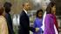 President Barack Obama, is greeted by Rev. Luis...