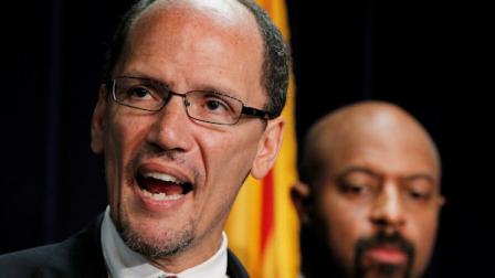 FILE - In this Thursday, May 10, 2012 file photo, United States Assistant Attorney General Thomas Perez, left, who heads up the civil rights division at the Department of Justice, is joined by Deputy Assistant Attorney General for Civil Rights, Roy Austin, as Perez announces a federal civil lawsuit against Maricopa County Sheriff Joe Arpaio during a news conference in Phoenix, after months of negotiations failed to yield an agreement to settle allegations that Arpaios department racially profiled Latinos in his trademark immigration patrols. Two people familiar with the process say President Barack Obama is close to naming Perez as his choice to head the Department of Labor. (AP Photo/Ross D. Franklin, File)