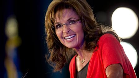 In this June 15, 2013 file photo, Sarah Palin speaks during the Faith and Freedom Coalition Road to Majority 2013 conference in Washington. North Jersey Media Group Inc., a New Jersey-based newspaper publisher, is suing Palin and her political action committee for copyright infringement over the use of an iconic Sept. 11 photograph. The photo depicts three New York City firefighters hoisting an American flag among the rubble at the World Trade Center after the attacks. (AP Photo/Carolyn Kaster, File)
