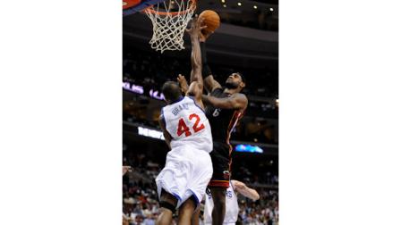 Miami Heat forward LeBron James (6) shoots over Philadelphia 76ers forward Elton Brand (42) during the fourth quarter of an NBA basketball game, Wednesday, Oct. 27, 2010, in Philadelphia. The Heat won 97-87. (AP Photo/Barbara Johnston)
