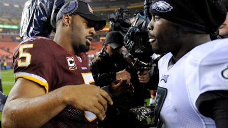 Washington Redskins quarterback Donovan McNabb, left, greets Philadelphia Eagles quarterback Michael Vick after the Eagles defeated the Redskins 59-28 in an NFL football game, Monday, Nov. 15, 2010, in Landover, Md. (AP Photo/Nick Wass)