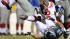 New York Giants safety Will Blackmon is upended...
