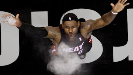 FILE - This Oct. 9, 2010, file photo shows Miami Heats LeBron James throwing powder into the air prior to the teams NBA preseason basketball game against the San Antonio Spurs, in San Antonio. (AP Photo/Eric Gay, File)