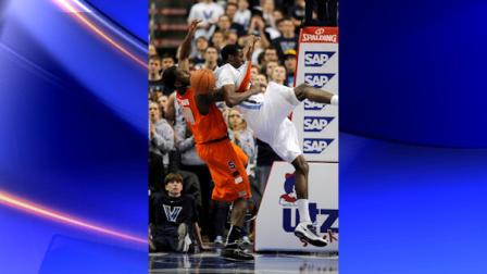 Villanova forward Isaiah Armwood (34) is fouled by Syracuse forward Rick Jackson (00) during the first half of an NCAA college basketball game, Monday, Feb. 21, 2011, in Philadelphia. (AP Photo/Barbara Johnston)