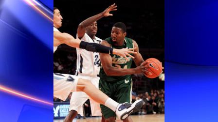 South Floridas Augustus Gilchrist (24) protects the ball from Villanovas Isaiah Armwood (34) and teammate Maurice Sutton during the first half of an NCAA college basketball game in the Big East Championship at Madison Square Garden, Tuesday, March 8, 2011, in New York. (AP Photo/Frank Franklin II)