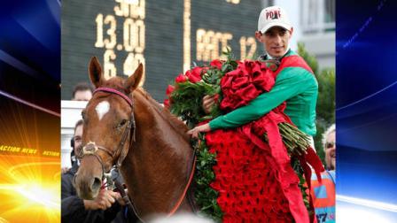 John Velazquez holds the Blanket of Roses after riding Animal Kingdom to victory during the 137th Kentucky Derby horse race at Churchill Downs Saturday, May 7, 2011, in Louisville, Ky. (AP Photo/Michael Conroy)