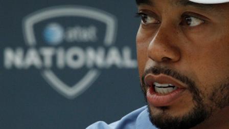 Tiger Woods makes remarks during a news conference at the AT&T National golf tournament at the Aronimink Golf Club Tuesday, June 28, 2011, in Newtown Square, Pa. Woods says hes done playing with pain. Woods says he is making progress in his recovery from injuries to his left leg, although he has no idea when he will return to golf. He says he has played with injuries too much in his career, and now is the time to be smarter about his health. (AP Photo/Matt Rourke)