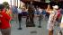 Fans photograph the newly unveiled statue of...
