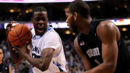 Villanova forward Isaiah Armwood, left, grabs a loose ball from Georgetown center Greg Monroe in the second half of an NCAA college basketball game Sunday, Jan. 17, 2010, in Philadelphia. Villanova won 82-77.