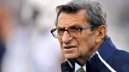 FILE - In this Oct. 22, 2011 file photo, Penn State coach Joe Paterno stands on the field before his teams NCAA college football game against Northwestern, in Evanston, Ill.