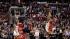 New Jersey Nets Deron Williams, right, shoots...