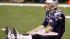 New England Patriots quarterback Tom Brady sits...