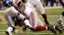 New York Giants defensive end Justin Tuck, top,...
