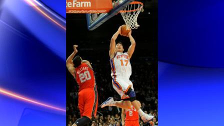 New York Knicks guard Jeremy Lin, right, goes up with a shot past New Jersey Nets guard Deron Williams during the second quarter of an NBA basketball game on Saturday, Feb. 4, 2012, at Madison Square Garden in New York. (AP Photo/Bill Kostroun)