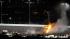 Flames shoot up from burning fuel after Juan...
