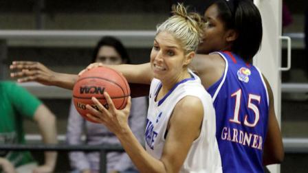 Delawares Elena Delle Donne, left, gets a defensive rebound from Kansas Chelsea Gardner (15) during the first half of an NCAA tournament second-round womens college basketball game in Little Rock, Ark., Tuesday, March 20, 2012. (AP Photo/Danny Johnston)