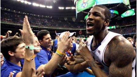 Kansas forward Thomas Robinson celebrates with fans after their 64-62 win over Ohio State during an NCAA Final Four semifinal college basketball tournament game Saturday, March 31, 2012, in New Orleans. (AP Photo/David J. Phillip)