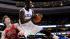 Philadelphia 76ers Jrue Holiday (11) pulls in a...