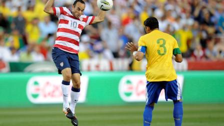 United States forward Landon Donovan (10) battles for the ball against Brazils Thiago Silva (3) during the first half of an international friendly soccer game on Wednesday, May 30, 2012, in Landover, Md. (AP Photo/Nick Wass)
