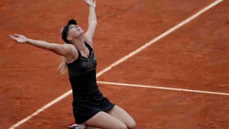 Russias Maria Sharapova reacts as she defeats Italys Sara Errani in their womens final match in the French Open tennis tournament at the Roland Garros stadium in Paris, Saturday, June 9, 2012. Sharapova won 6-3, 6-2. (AP Photo/Michel Spingler)