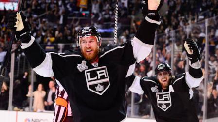 Los Angeles Kings center Jeff Carter, left, and Los Angeles Kings Anze Kopitar celebrate after Carters goal against the New Jersey Devils in the second period during Game 6 of the NHL hockey Stanley Cup finals, Monday, June 11, 2012, in Los Angeles. (AP Photo/Mark J. Terrill)