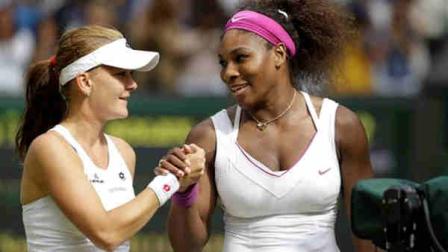 Serena Williams of the United States, right, is congratulated by Agnieszka Radwanska of Poland after winning the womens final match at the All England Lawn Tennis Championships at Wimbledon, England, Saturday, July 7, 2012. (AP Photo/Alastair Grant)