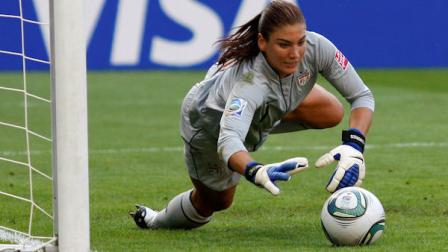 FILE - In this July 10, 2011, file photo, United States goalkeeper Hope Solo catches a ball during the quarterfinal match against Brazil at the Womens Soccer World Cup in Dresden, Germany. Solo received a public warning Monday, July 9, 2012, from the U.S. Anti-Doping Agency after she tested positive for the banned substance Canrenone in a urine test. Solo has accepted the warning and will still play for the United States in the Olympic tournament. (AP Photo/Petr David Josek, File)