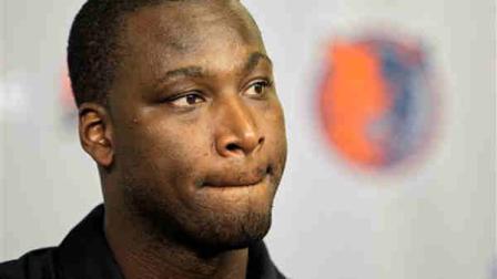 Basketball player Kwame Brown reacts during a news conference where it was announced that the signed as a free agent with the Charlotte Bobcats NBA basketball team in Charlotte, N.C., Tuesday, Aug. 24, 2010. (AP Photo/Chuck Burton)